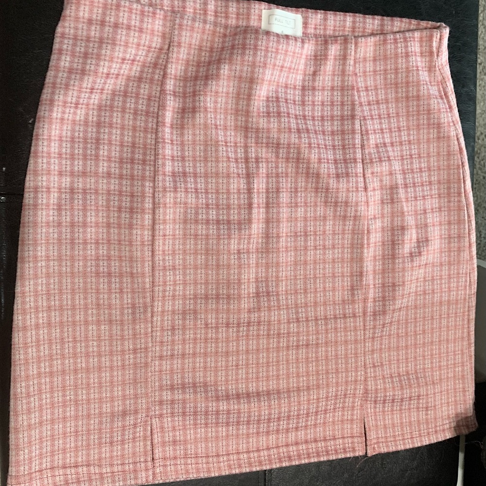 The skirt is from Tilly’s, only worn once, and it is in great condition.